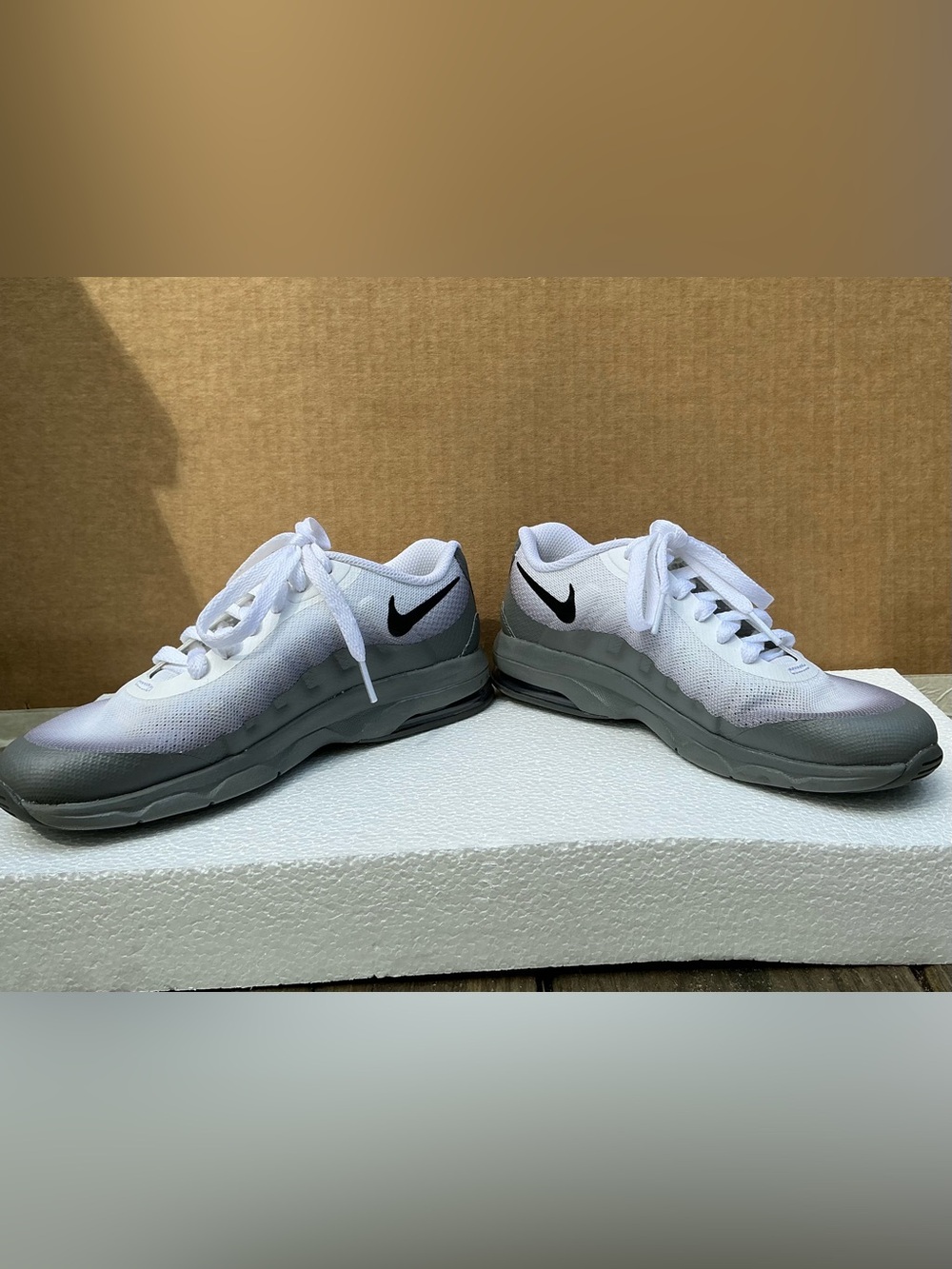 Nike Kids White and Gray Low-Top Sneakers with Black Swoosh